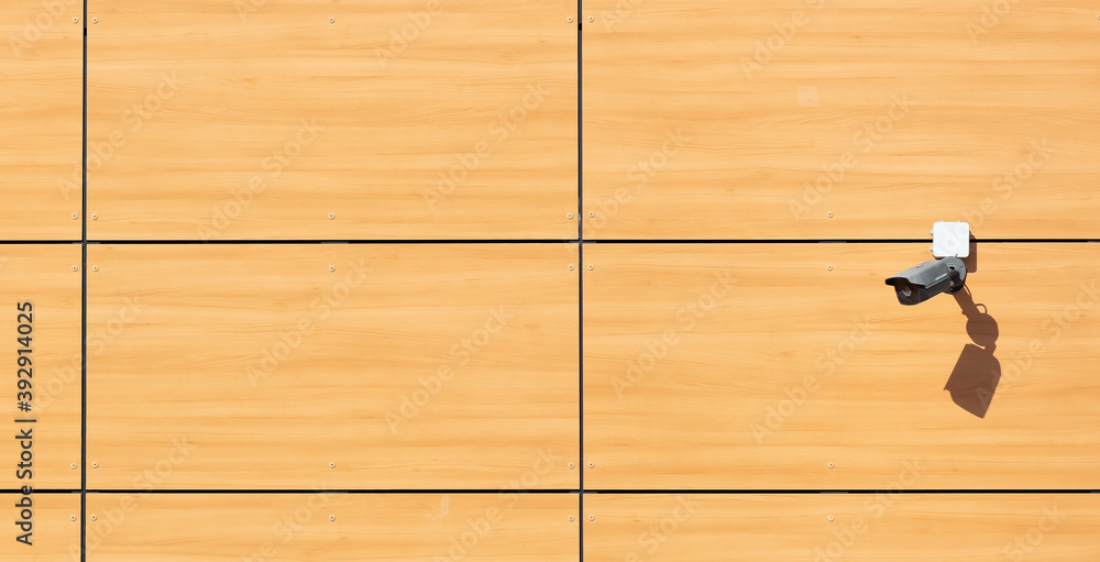 Surveillance CCTV Security Camera on wooden wall building facade. Surveillance CCTV Security Camera on wooden wall building facade.