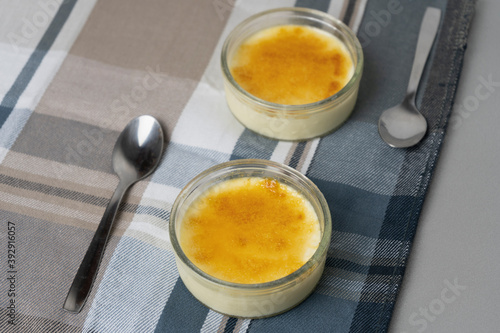 Fotografie Crème brûlée or burnt cream, presentation with two spoons
