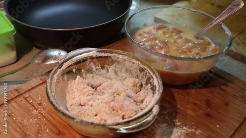 Preparing sweet and sour asian chicken nuggets using olive oil, ingrediences in detail photo