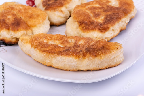 Traditional Bulgarian, Balkan homemade dough breakfast Mekitsi, Mekici fried in deep oil © d_zheleva