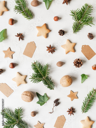 Natural christmas pattern from fir twigs and cones, spices,