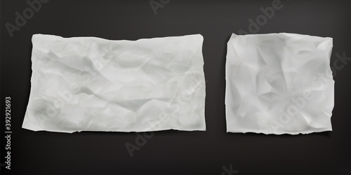 Crumpled baking paper sheets isolated on gray background. Vector realistic mockup of blank old paper with wrinkled texture, creases and torn edges. Greaseproof parchment leaf photo