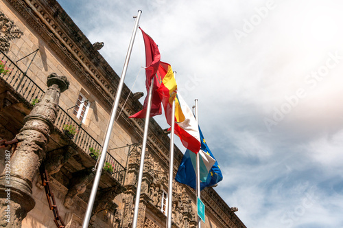 flags in plaza del obradoiro in santiago de compostela photo