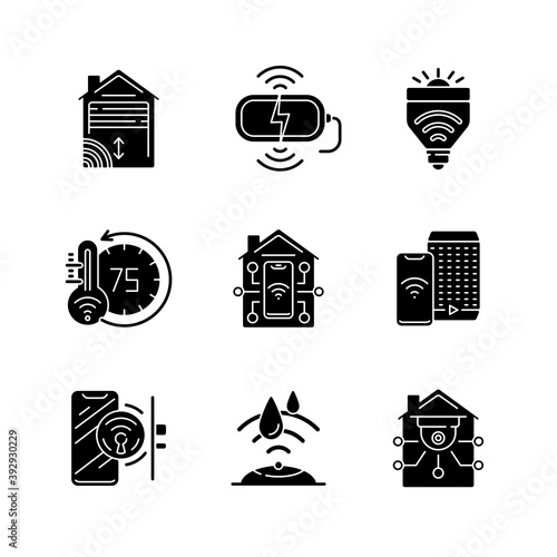 Smart home black glyph icons set on white space. Wireless charging station for your phone and tablet. Outside water detector technology. Silhouette symbols. Vector isolated illustration