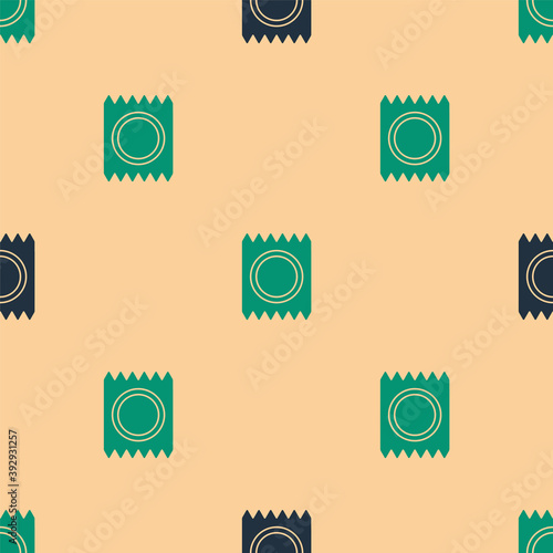 Green and black Condom in package safe sex icon isolated seamless pattern on beige background. Safe love symbol. Contraceptive method for male. Vector.