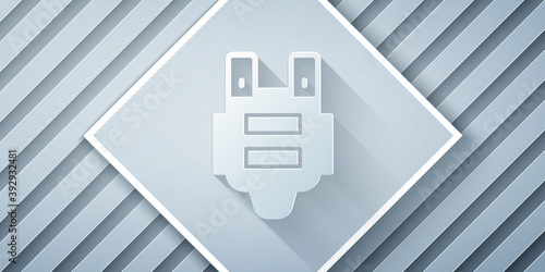 Paper cut Bulletproof vest for protection from bullets icon isolated on grey background. Body armor sign. Military clothing. Paper art style. Vector.