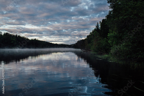 Mist on The Spanish River in Massey Ontario with cloudy sky photo