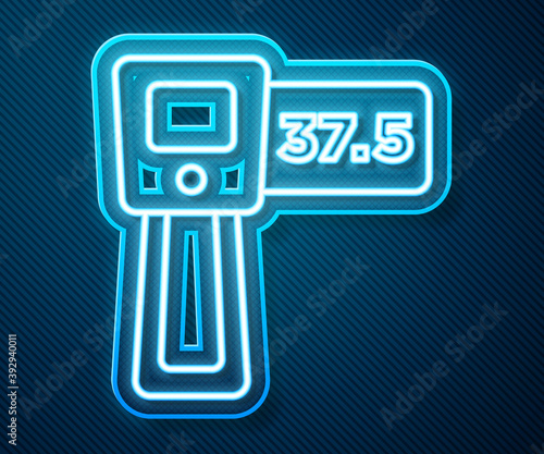 Glowing neon line Digital contactless thermometer with infrared light icon isolated on blue background. Vector.