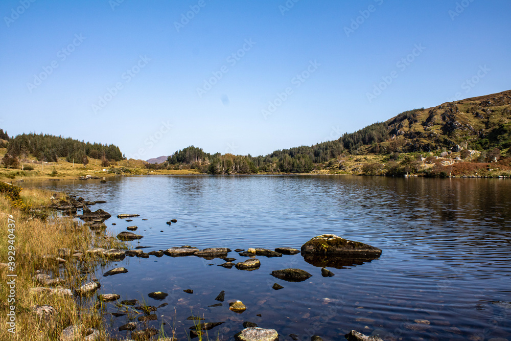 Shehy Mountains on the border between County Cork and County Kerry. When the icecaps retreated, they left behind hundreds of lakes in the valley Shehy Mountains on the border between County Cork and County Kerry. When the icecaps retreated, they left behind hundreds of lakes in the valley
