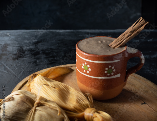 Atole champurrado y tamales, gastronomia mexicana  photo