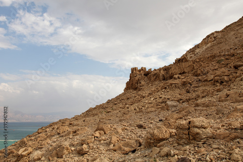 Part of the mountain against the background of the sky and the sea.