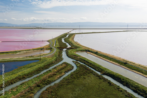 Canvas Print Multi Colored Water in Ponds and Stream in Salt Marsh in SF Bay Aerial