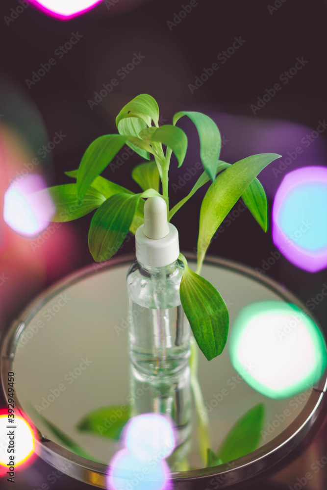 Beauty holiday gift - a serum skin care pipette package, product with natural ingredients for fresh and glowy skin. Text space for holiday offers Beauty holiday gift - a serum skin care pipette package, product with natural ingredients for fresh and glowy skin. Text space for holiday offers