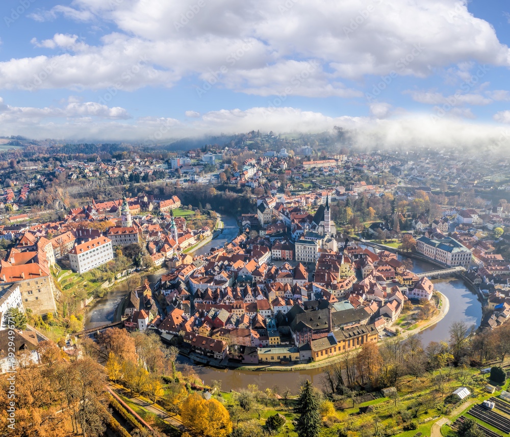 Fototapeta premium Panoramic aerial view over towncenter of Cesky Krumlov during autumn season in Czech Republic