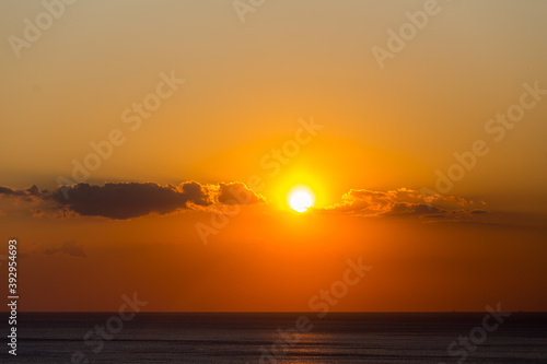 Beautiful sunset over the sea orange coclor.
