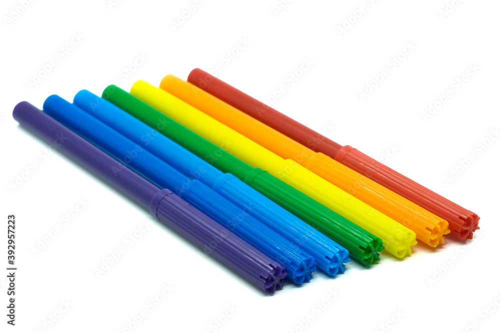 Colored felt-tip pens isolated on white background. Colored markers on white. Drawing concept. Colored felt-tip pens isolated on white background. Colored markers on white. Drawing concept.