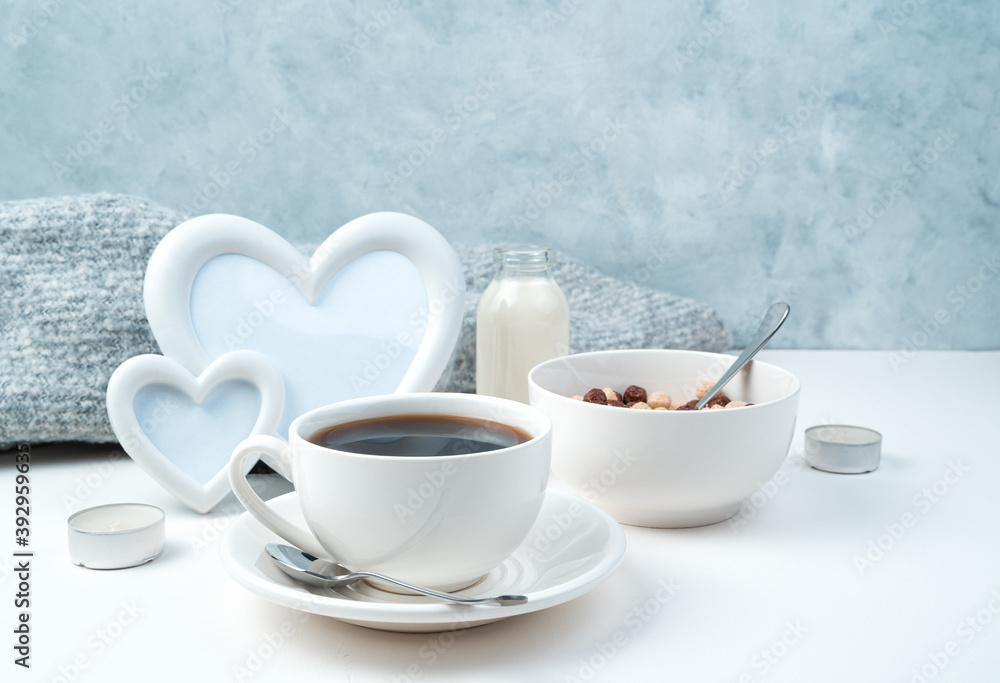 A Cup of coffee and chocolate balls on a festive background. Side view. The concept of proper nutrition and holidays, February 14, women's day. A Cup of coffee and chocolate balls on a festive background. Side view. The concept of proper nutrition and holidays, February 14, women's day.