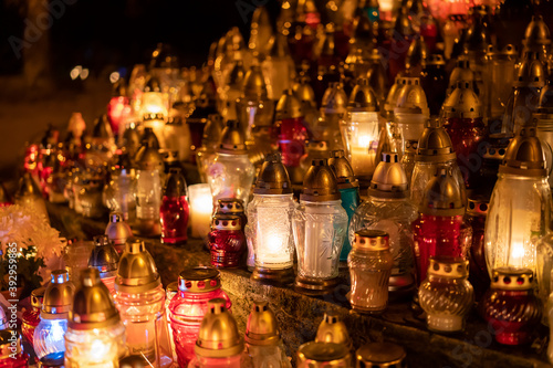 Candles on the grave. Cemetery. © Bogumił Dłubek