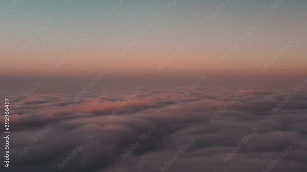 Drone fly down to the perfect thick clouds in sunset lights. Beauty relaxing footage of dreamy nature Drone fly down to the perfect thick clouds in sunset lights. Beauty relaxing footage of dreamy nature