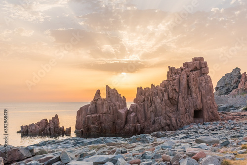 Geological feature called "Rocce rosse" (red rocks) along the coastline in Arbatax (Sardinia, Italy) at the sunrise