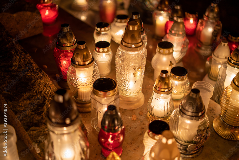 All Saints' Day. Candles on the graves of the dead. All Saints' Day. Candles on the graves of the dead.