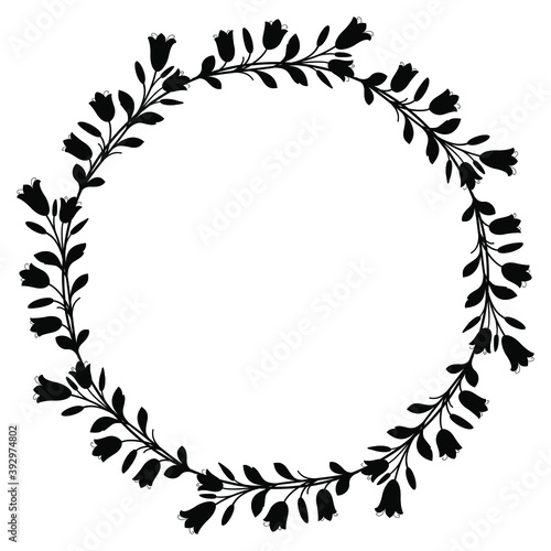 Round floral frame or background. Wreath of bluebell flowers. Black silhouette on white background.