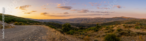 Sunset on the mountain, view of the valley at sunset