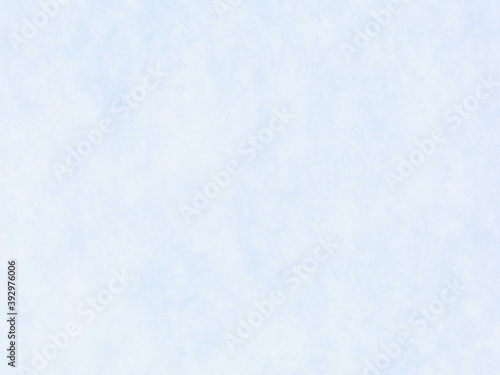 Natural snow texture. Smooth surface of clean fresh snow. Snowy ground. Winter background with snow patterns. Perfect for Christmas and New Year design. Closeup top view. Soft blurred background.