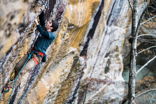 Young man lead climbing in the Red River Gorge, KY. photo