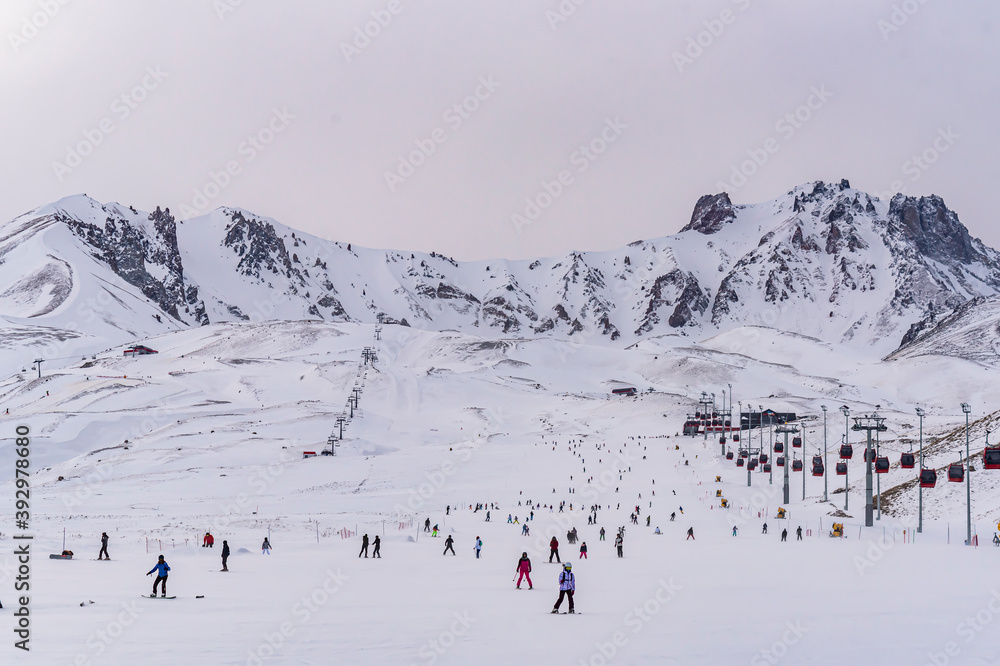 People skiing in Erciyes ski resort. Snowy Mount Erciyes