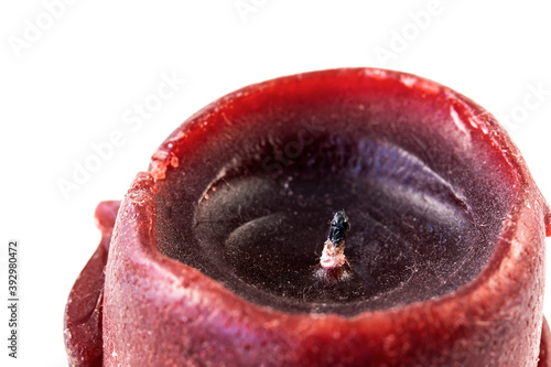 Close up of unlit red candle