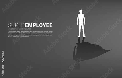 Silhouette of businessman and his shadow of superhero.concept of empower potential and human resource management