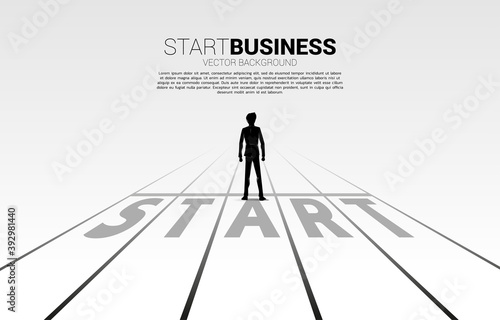 Silhouette of businessman standing at start line. Concept of people ready to start career and business
