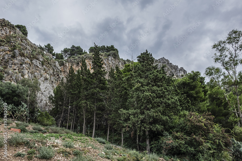 Fototapeta premium Wonderful scenery of the Rocca Mountain. La Rocca Mountain dominates the silhouette of Cefalu. Province of Palermo, Cefalu, Sicily, Italy.