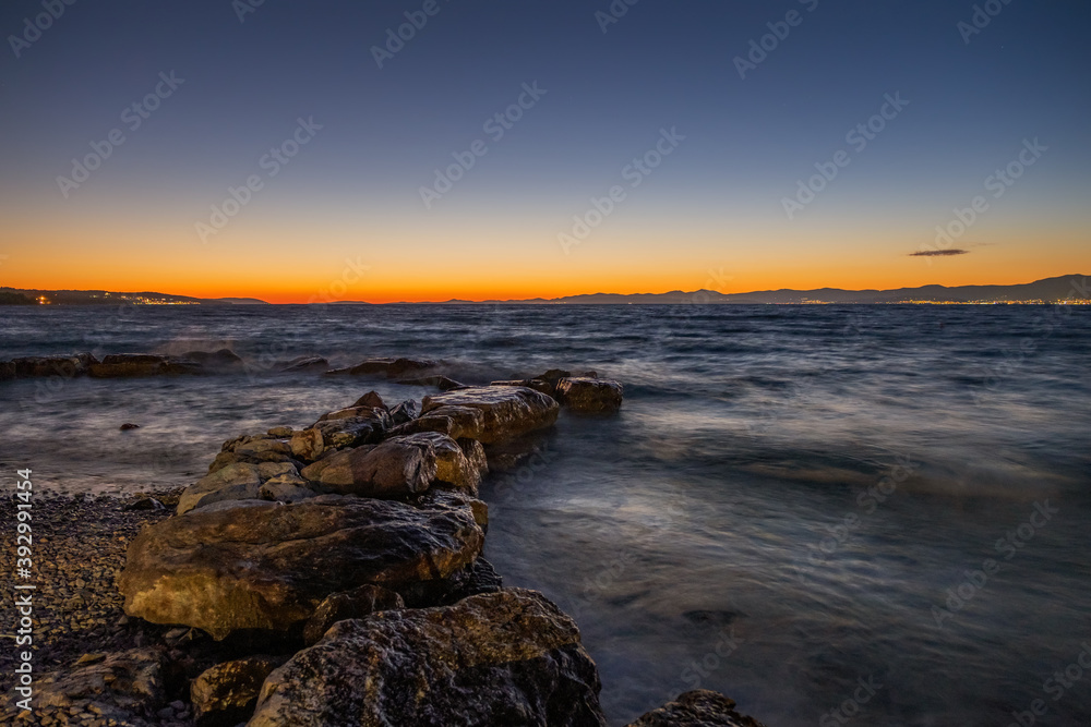 Croatia, Brac island, beach Supetrus at sunset near Supetar. August 2020. Long exposure picture.