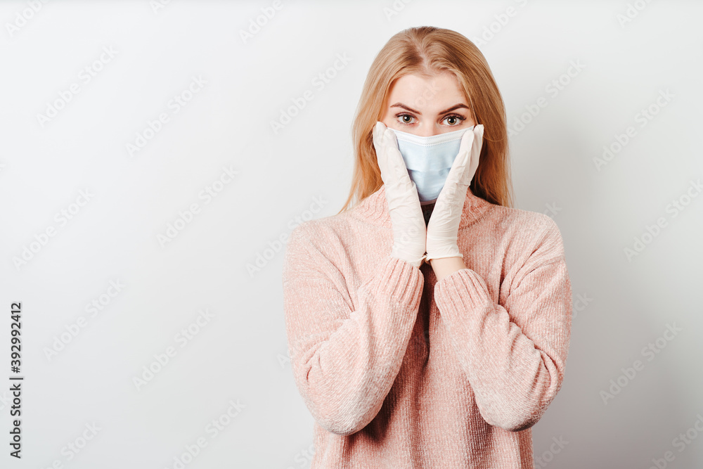Shocked overwhelmed woman wearing a face mask Shocked overwhelmed woman wearing a face mask