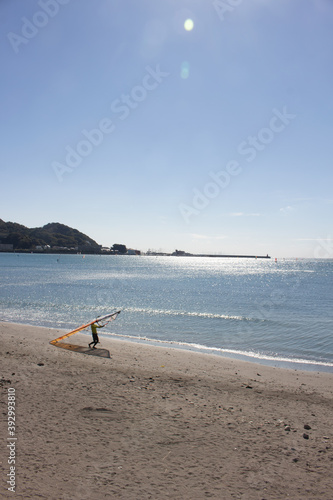 海、砂浜、サーファー photo