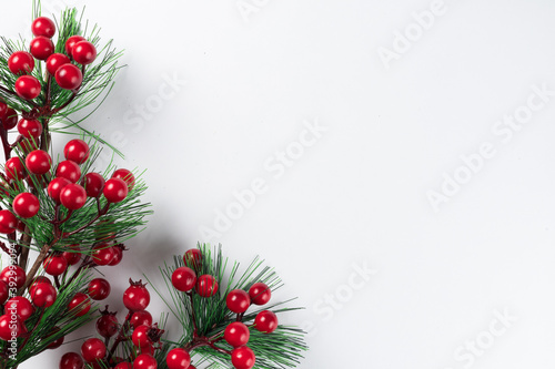 Christmas new year composition on white background. Fir branches, christmas decoration. Flat lay, top view, copy space