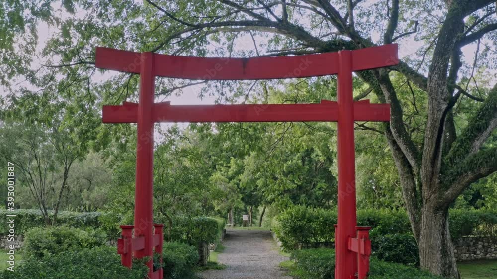 Moving toward red entrance of Japanese Garden, Santo Domingo. Slow-motion Moving toward red entrance of Japanese Garden, Santo Domingo. Slow-motion