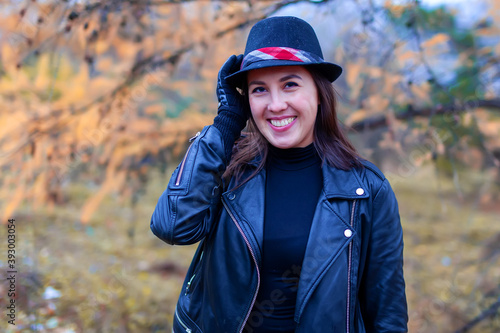 young woman with hat in autumn