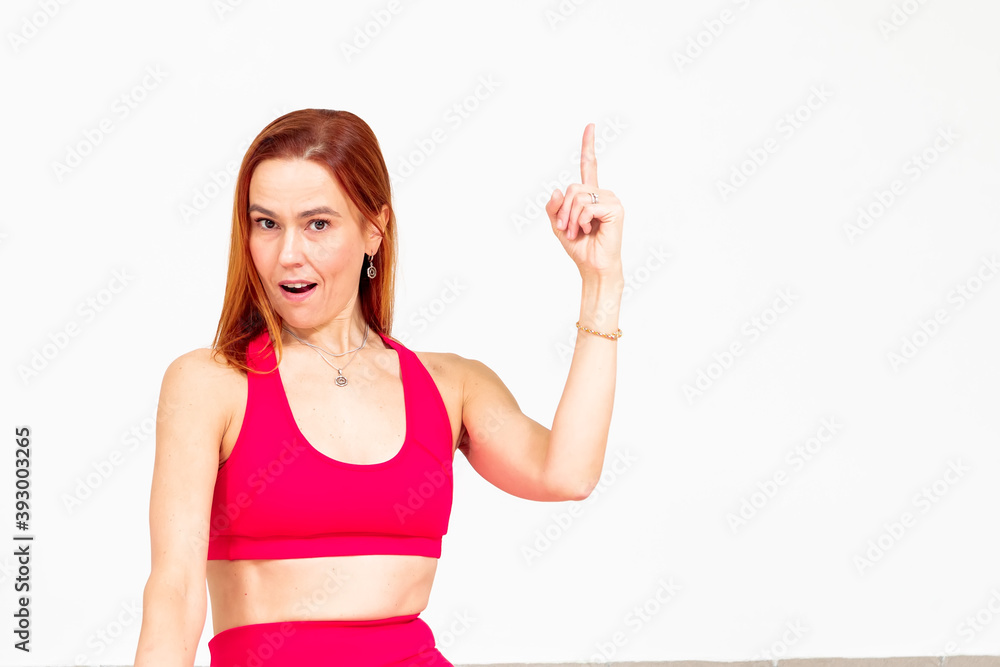 sportive woman with index finger up sportive woman with index finger up