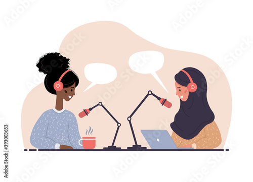 Podcast concept. Islamic and african women in headphones at table recording audio broadcast. Interview with radio host. Vector illustration in flat cartoon style.
