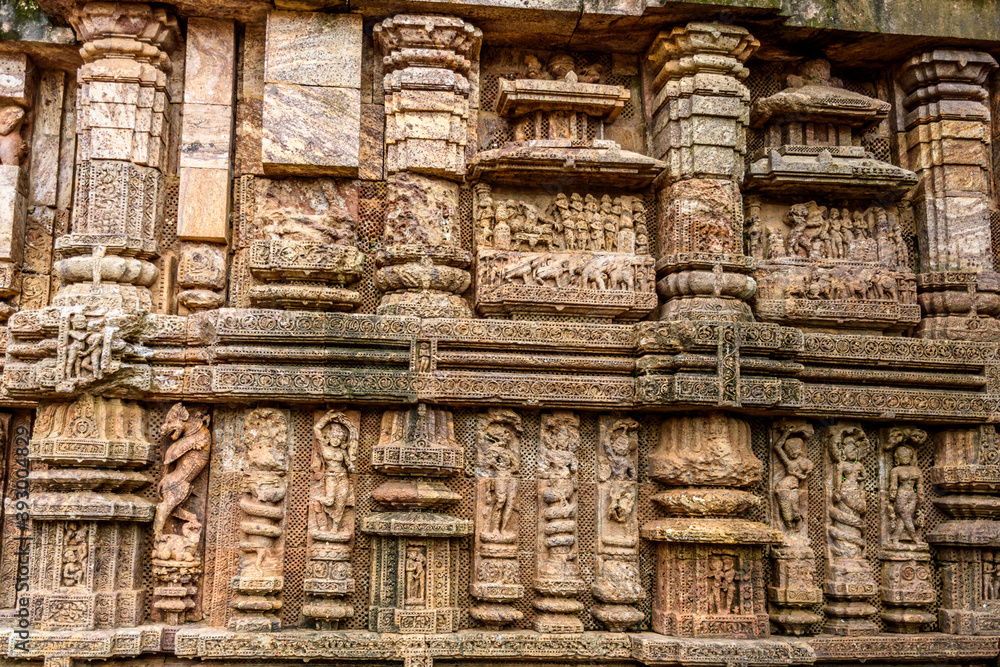 Ancient sandstone carvings on the walls of the ancient sun temple at Konark, India.
Ancient sandstone carvings on the walls of the ancient sun temple at Konark, India.