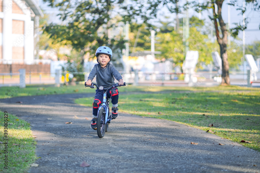 child riding a bike child riding a bike