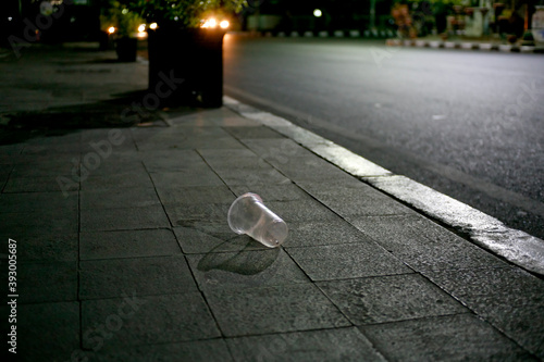 plastic cup in the street photo