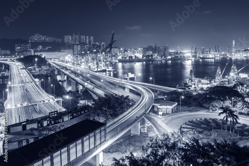 cargo port and highway in Hong Kong city at night