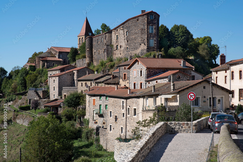 Picturesque village of Saint Privat d'Allier in Auvergne in France with stone houses and a church
