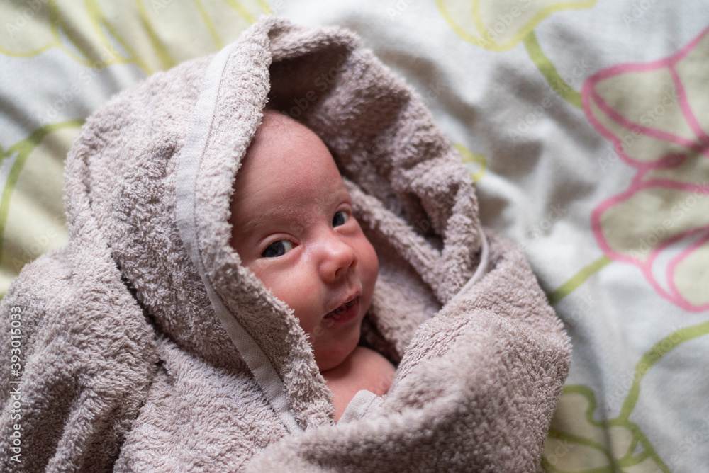 portrait of a baby in a towel portrait of a baby in a towel