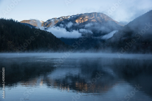 A foggy morning landscape in North Cascades National Park in Washington state.
