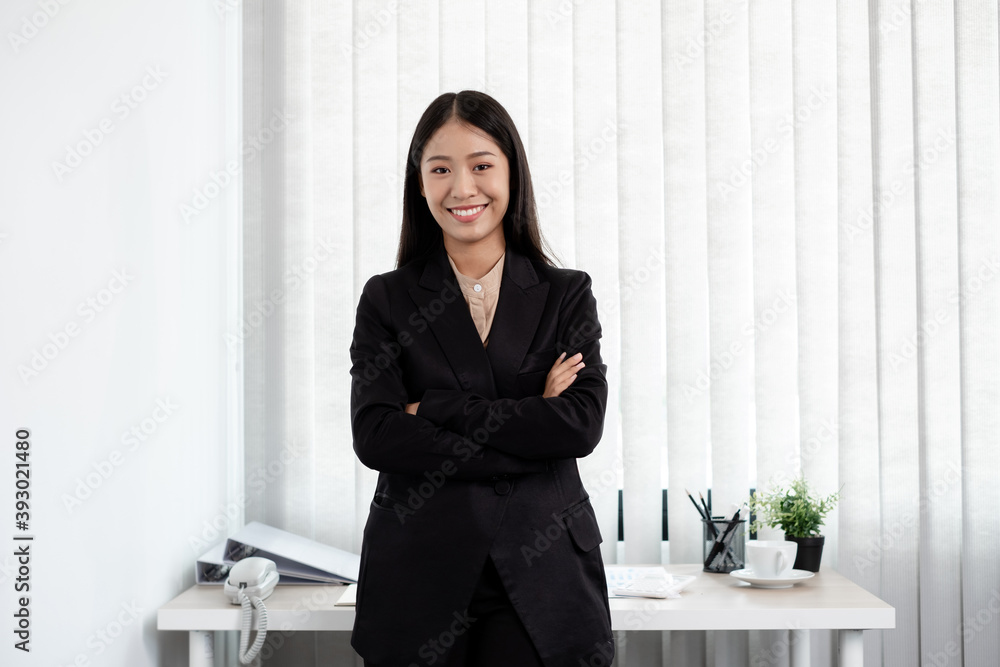 Asian businesswoman. stand happy smile the office Asian businesswoman. stand happy smile the office